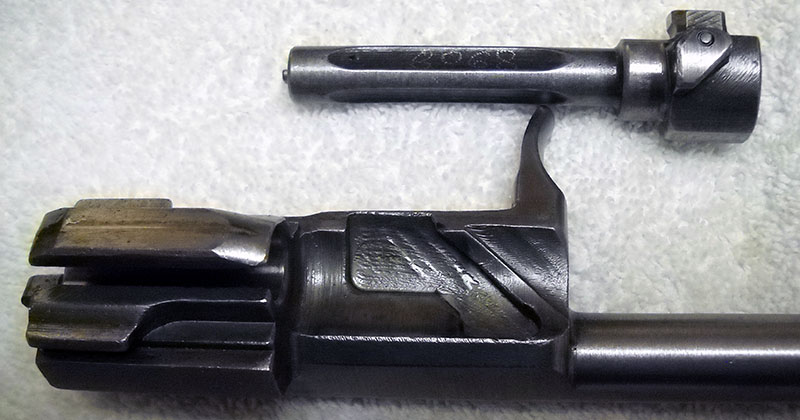 detail, M70 bolt and carrier, showing bolt rotating cam slot